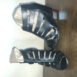 BCBGeneration black leather wedge size 6.5